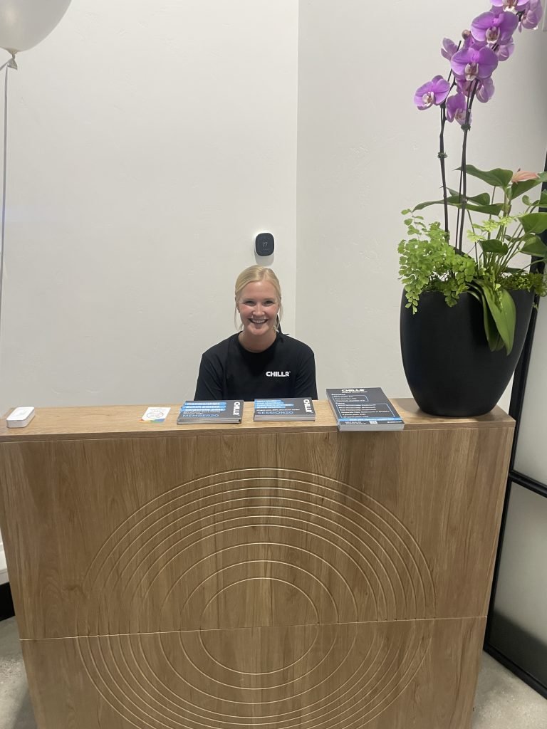 Hostess Jacee at the front desk of CHILLR°